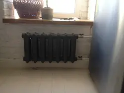Black radiator in the kitchen photo