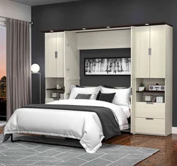 Bed side view in bedroom photo