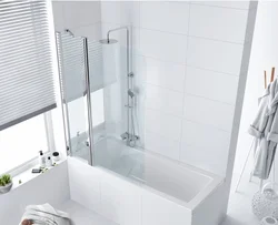 Bathtubs with plastic curtains photo