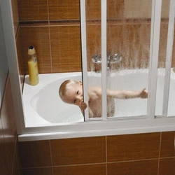 Bathtubs with plastic curtains photo