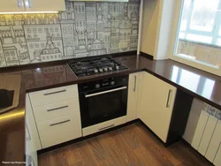 Kitchen with a single countertop photo