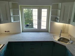 Kitchen with a single countertop photo