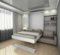 Bed in a small living room photo