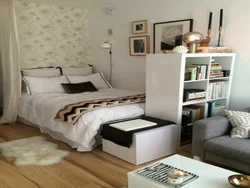 Bed in a small living room photo