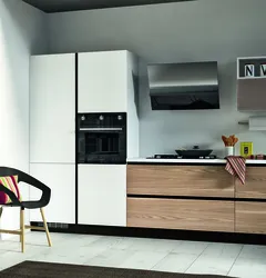 Şaquli tutacaqları olan bir mətbəxin fotoşəkili
