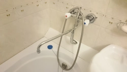 Bathtub faucet from the wall photo