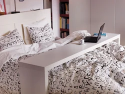 Photo bedroom table by the bed