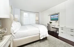 TV in a narrow bedroom photo