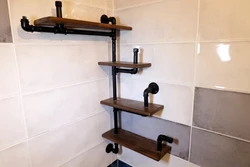 Shelves in loft bathroom photo