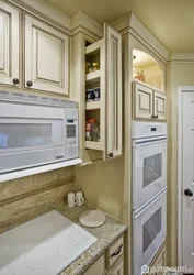Narrow cabinets in the kitchen photo