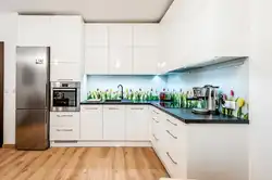 White kitchen with cities photo