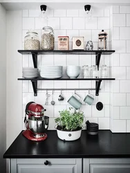 Black shelves in the kitchen photo