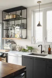 Black shelves in the kitchen photo