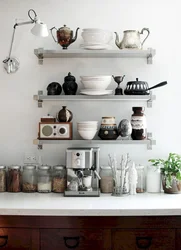 Black shelves in the kitchen photo