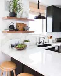 Black shelves in the kitchen photo