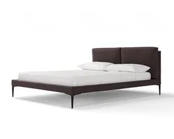Bedroom bed with legs photo