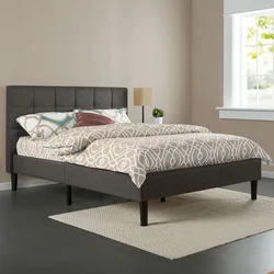 Bedroom bed with legs photo