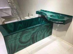 Bathtubs made of liquid stone photo