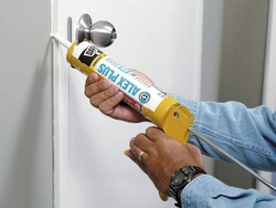 White sealant for bathtub photo