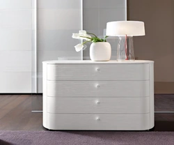 Glossy chest of drawers in the bedroom photo