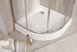 Photo of a bathtub with a deep tray