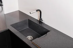 Kitchen with cast countertop photo