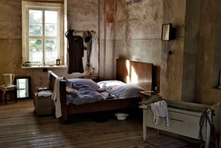 Bedroom in an old house photo