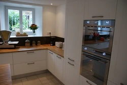 Kitchens at the entrance on the right photo