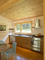 Kitchen ceiling in the country house photo