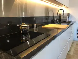 Kitchens with black granite photo
