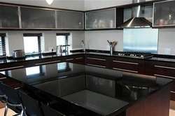 Kitchens with black granite photo