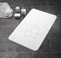 White bath mat photo