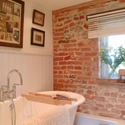 Bathtub with brick panels photo