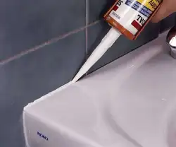 White sealant for bathroom photo