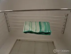 Жуынатын бөлмедегі шағын фотодағы кептіргіш
