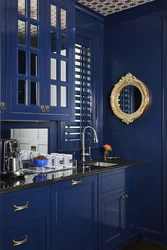 Blue kitchen black countertop photo