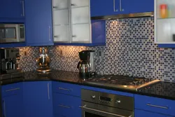 Blue kitchen black countertop photo