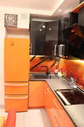Orange Kitchen Black Countertop Photo