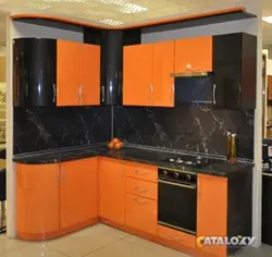 Orange kitchen black countertop photo