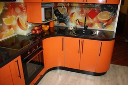 Orange Kitchen Black Countertop Photo