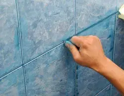Tile joints in the bathroom photo