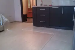 Laminate flooring in the kitchen like tiles photo
