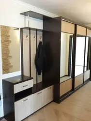 Hallway with compartment and hanger photo
