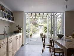 Photos of houses with a door from the kitchen