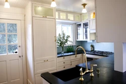 Kitchens to the ceiling with a window photo