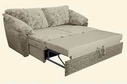 Folding sofa with sleeping place photo