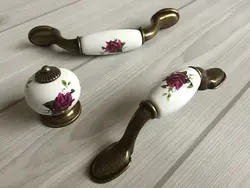 Kitchen handles with flowers photo