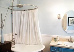 Bathtub with shower curtain photo