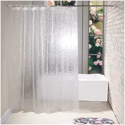 Bathtub with shower curtain photo