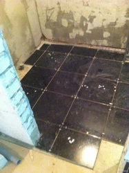 Photo of bathroom tiles near the door